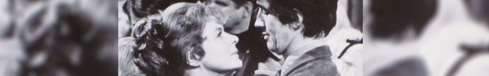 A cropped view of Ingrid Bergman and Rick Lenz in Cactus Flower.